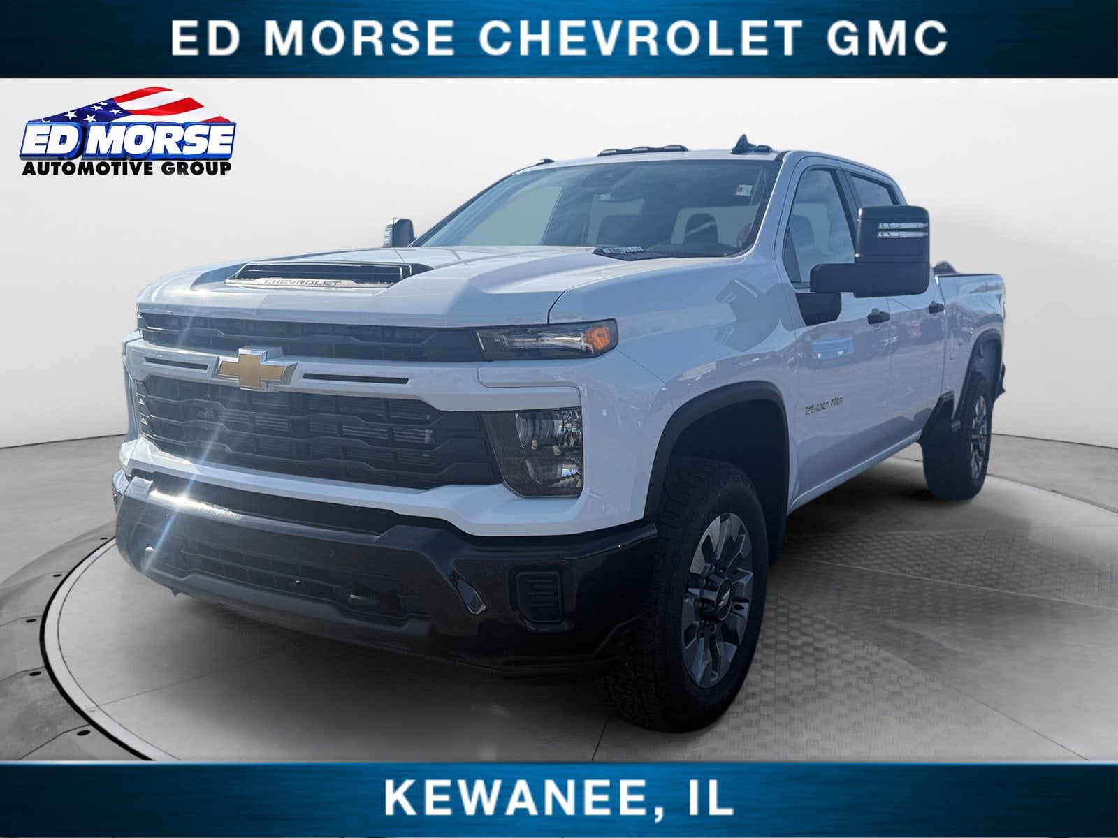 2025 Chevrolet Silverado 2500 HD Custom in Summit White — front three-quarter view